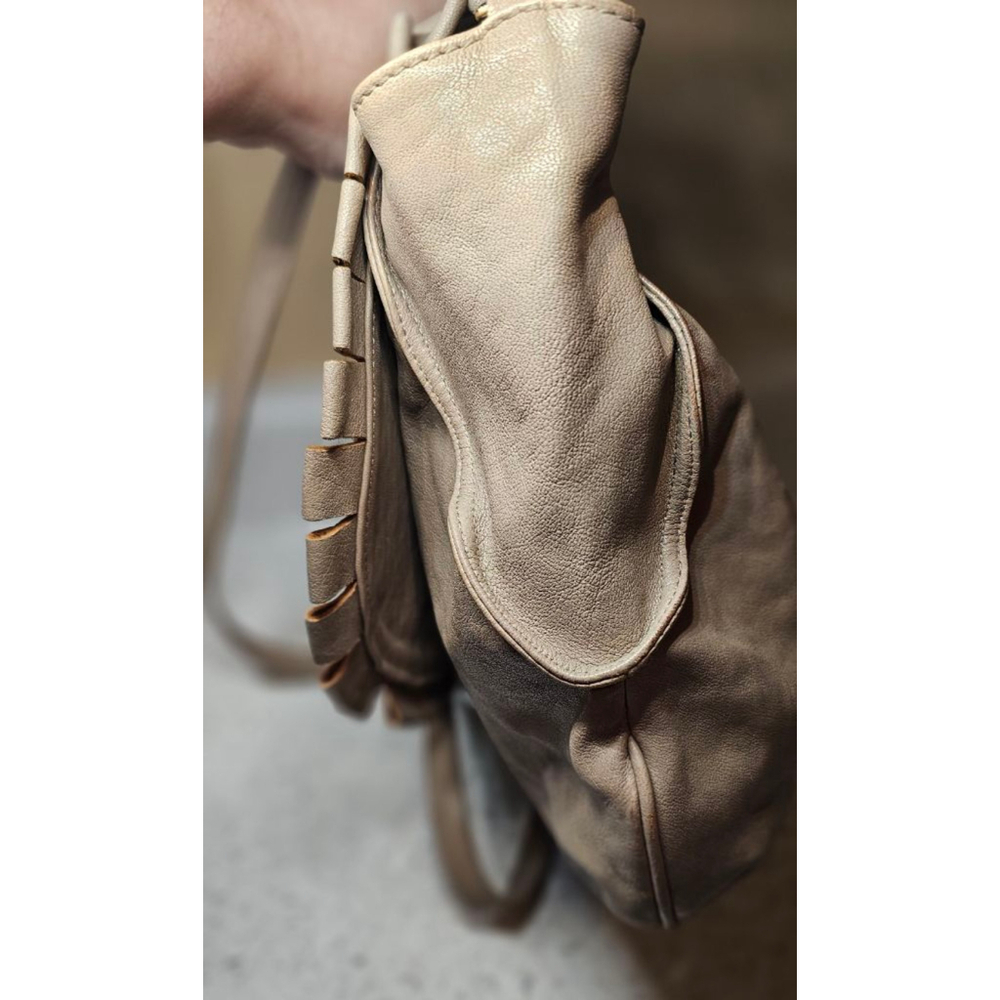 Charming Red(V) leather 2 way wear cross-body with a stylish fringe bow detail - Picture 6 of 12